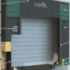 Dock shelter with foam side pads and guide stripes designed for trailer alignment and sealing.