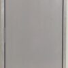Stainless steel access door with a flush panel design for sanitary facility applications.
