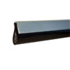 Brush seal with aluminum retainer installed along a door edge to block drafts, dust, and insects.