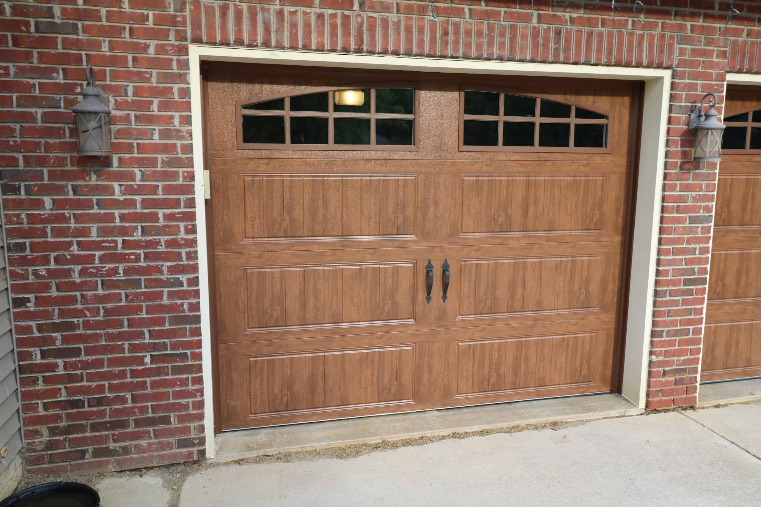 Wooden door on brick house