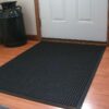 Black Stop-N-Dry Carpet on Residential Wooden Floor