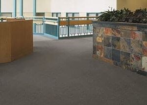Building carpeted with strong durable carpet tile pin