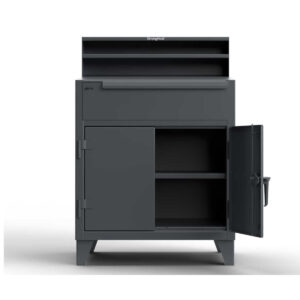 Dark gray shop desk with four closed compartment, one drawer, and a riser shelf,, standing on 6-inch legs.