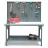 Industrial workbench with pegboard back panel and lower shelf