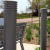 Cinco Decorative Bollard Covers in use near park benches