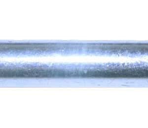 Close Up of Zerk Caster Axle with Lock Nut to Show Material