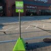 Pyramid Sign Base in use in parking lot