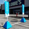 Pyramid Sign Base in use to label parking spot as Curbside pickup