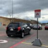 Pyramid Sign Base in use to label parking spot as Curbside pickup
