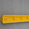 Bottom of Yellow Standard Ultra Parking Block from Barron Equipment